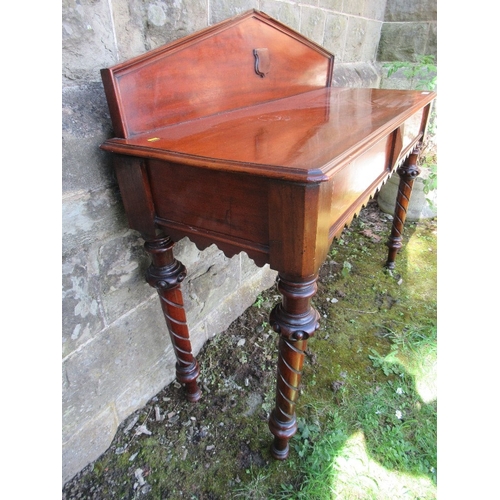 10 - A 19th century mahogany serving table, raised on turned legs, width 48ins