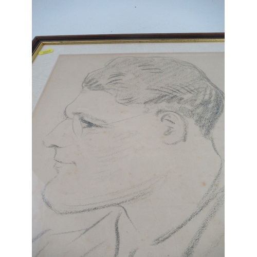 112 - A portrait of a gentleman in profile monogramed BS dated 1934 17ins x 12ins