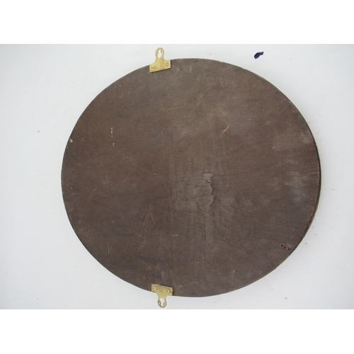 12 - An oval mirror, having a painted and carved frame, with beveled plate, width 24ins