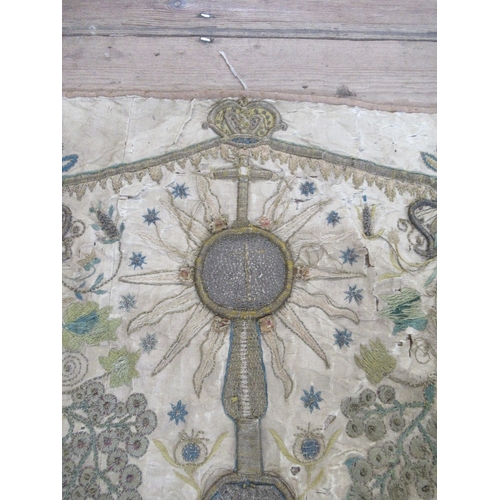 137 - A square antique needlework panel, a central sunburst motif with cross over with further decoration ... 