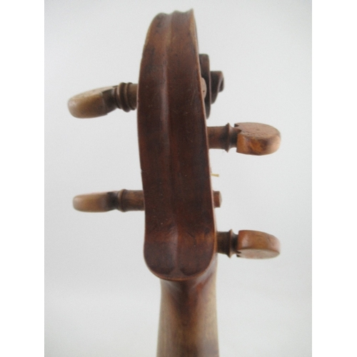 139 - A cased violin, with two piece back, bearing label for repairer M. Andersen