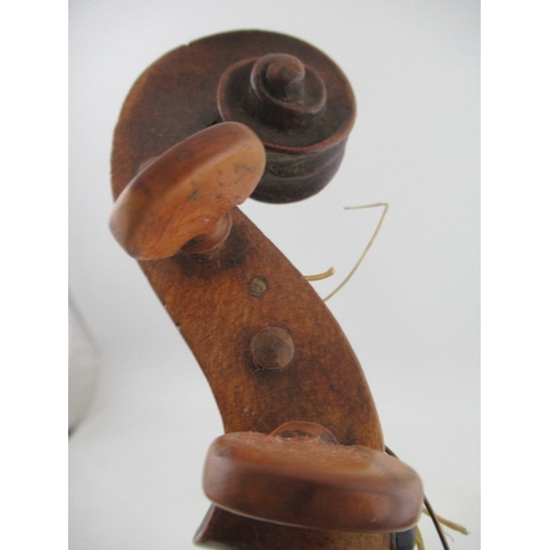 139 - A cased violin, with two piece back, bearing label for repairer M. Andersen