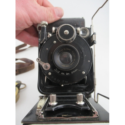 150 - A ICA Dresden folding camera, together with a Short & mason Ltd London Army issue compass, in brass ... 