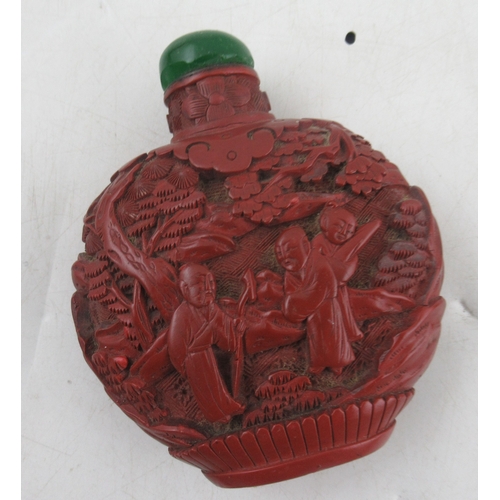 154 - A 19th century Chinese carved tortoiseshell box, together with a red lacquered bottle