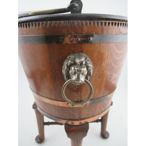 155 - A 19th century coopered oak copper banded wine cooler with lift out liner