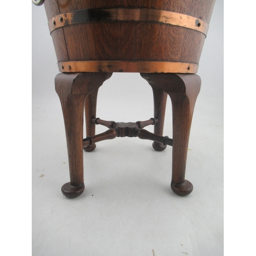 155 - A 19th century coopered oak copper banded wine cooler with lift out liner