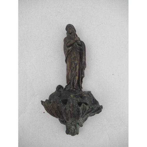 156 - A 19th century continental cold painted bronze holy water stoup modelled as the the Madonna with cla... 