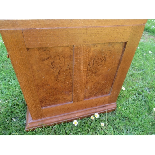 16 - An Arts and Crafts oak and burr wood table top cabinet, width 9ins, height 16.5ins