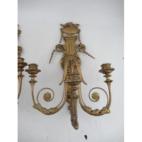 166 - A pair of  Antique Chippendale style wood and gesso gilt three light candelabra surmounted by an urn... 