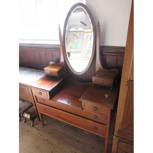 2 - An Edwardian bedroom suite, comprising mirror door wardrobe, dressing table and marble topped wash s... 