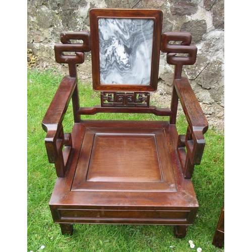 23 - A Chinese hardwood three piece suite, with marble insets, the settee width 69ins