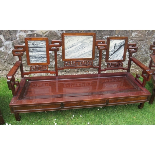 23 - A Chinese hardwood three piece suite, with marble insets, the settee width 69ins