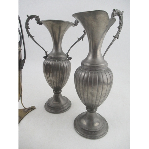 230 - A collection of metalware, to include a ewer, jug, vase and tea pot