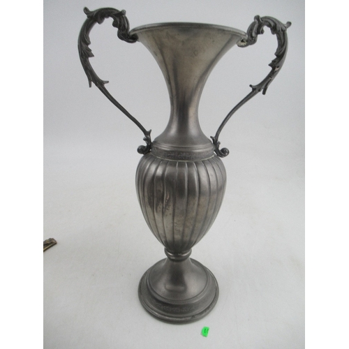 230 - A collection of metalware, to include a ewer, jug, vase and tea pot