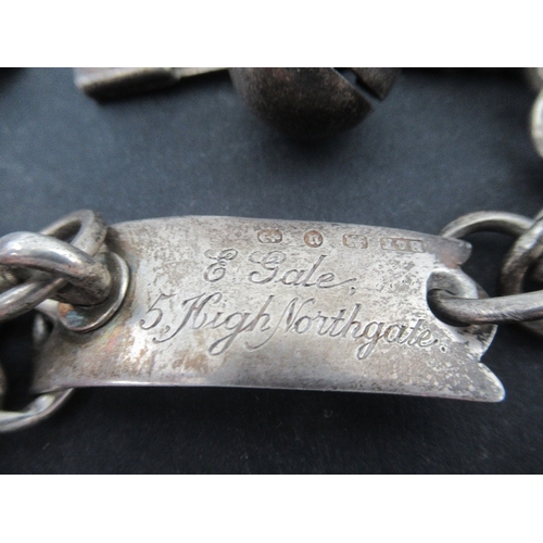 233 - A Barrett & Sons London, a silver cat or dog collar, with curb links and engraved plaque, with bell,... 