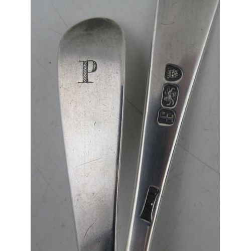 242 - A pair of Georgian silver serving spoons, engraved with a P, maker TW, together with a pair of silve... 