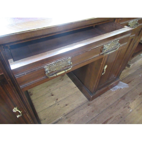 25 - A mahogany desk, with leather writing surface, width 49ins