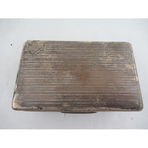 251 - A silver cigarette box, with engine turned decoration and wooden lined interior, 5.5ins x 3.5ins