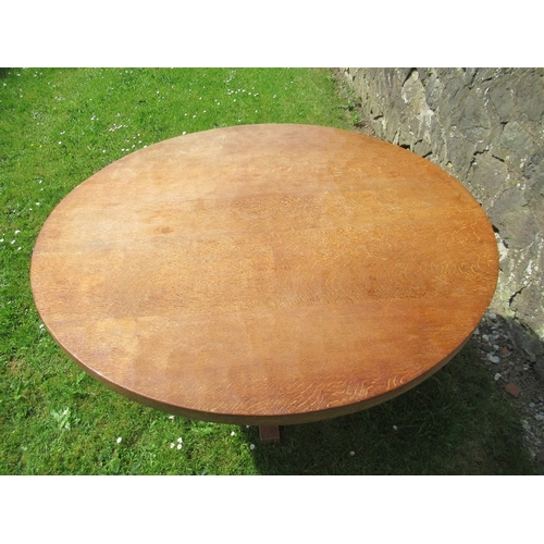 29 - Foxman Don Craven (Boroughbridge), an oak circular dining table with adze top, diameter 48ins, heigh... 