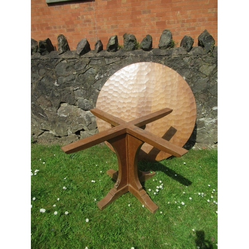 29 - Foxman Don Craven (Boroughbridge), an oak circular dining table with adze top, diameter 48ins, heigh... 