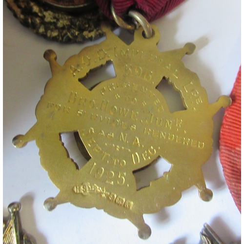 296 - A collection of silver and silver gilt Lodge medal, most with ribbons and bars