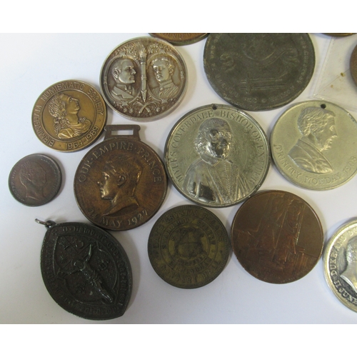 300 - A collection of 19th and 20th century medals and tokens, to include British Empire Exhibition 1924