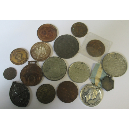 300 - A collection of 19th and 20th century medals and tokens, to include British Empire Exhibition 1924