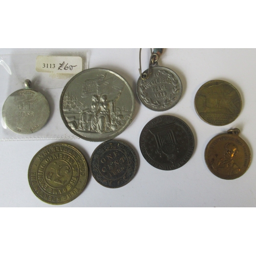 301 - A collection of medals and tokens, to include the International Exhibition, Kingswood & District med... 