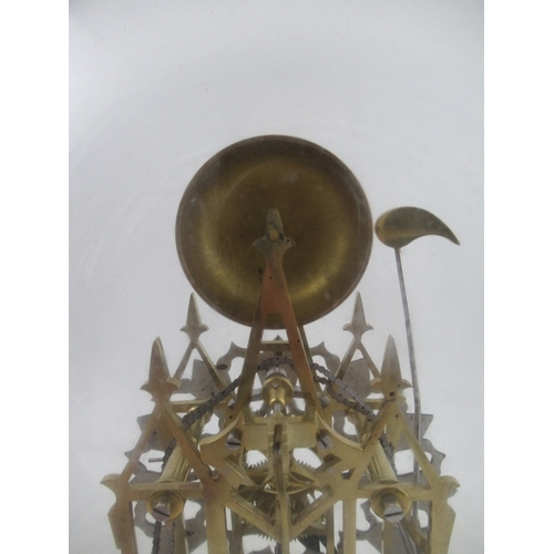 306 - Skeleton Clock with pierced silver Chapter Ring twin chain under a glass dome