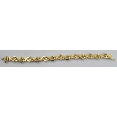 327 - A Tiffany & Co Paloma 18k loving heart link bracelet, weight 31.4g