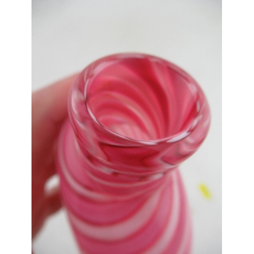 329 - A Nailsea style pink and white glass flask, height 6ins