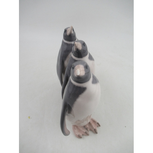 331 - Royal Copenhagen model of three penguins (one tip of beak damaged) height 10ins made before 193 No 4... 