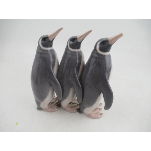 331 - Royal Copenhagen model of three penguins (one tip of beak damaged) height 10ins made before 193 No 4... 