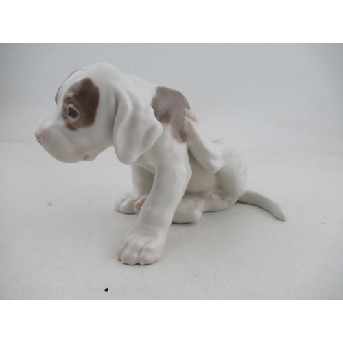 332 - Bing and Grondahl large model of seated puppy No 1690 made in 1915 height 9ins, length 11ins