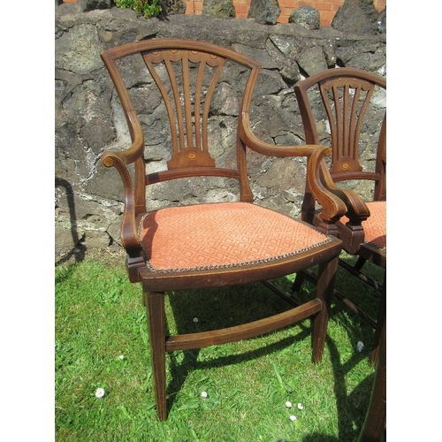 34 - An Edwardian salon suite, comprising settee, two armchairs and three single chairs, 1 af