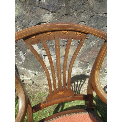 34 - An Edwardian salon suite, comprising settee, two armchairs and three single chairs, 1 af