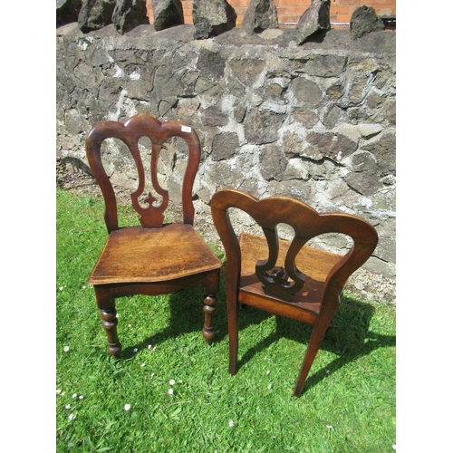 35 - A pair of 19th century mahogany hall chairs