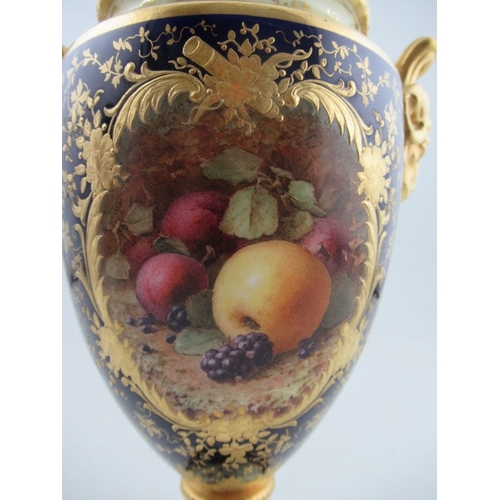 354 - A large Coalport vase decorated with blue and ivory gilded ground reserving a fruit panel of plums, ... 