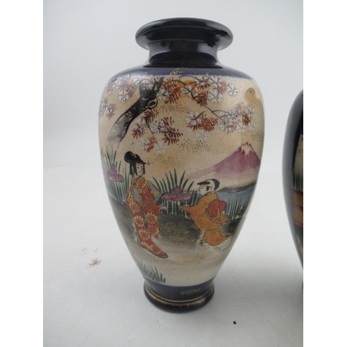 356 - A pair of 20th century Satsuma vases, decorated with figures in landscape, height 7.5ins