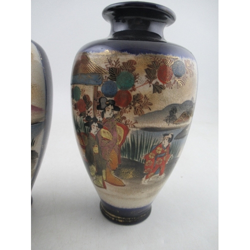 356 - A pair of 20th century Satsuma vases, decorated with figures in landscape, height 7.5ins