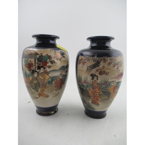 356 - A pair of 20th century Satsuma vases, decorated with figures in landscape, height 7.5ins