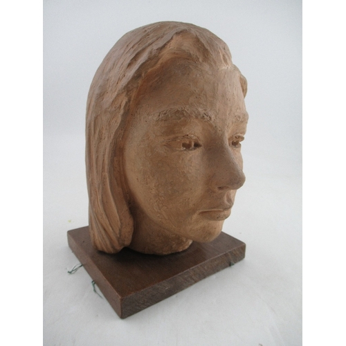 360 - A 20th century terracotta bust, of a young woman, on wooden base, height, 10.5ins