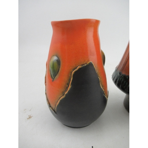 370 - A Bretby vase, in orange and black, numbered 3360, height 7.5ins, together with another vase, height... 