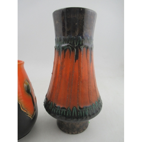 370 - A Bretby vase, in orange and black, numbered 3360, height 7.5ins, together with another vase, height... 