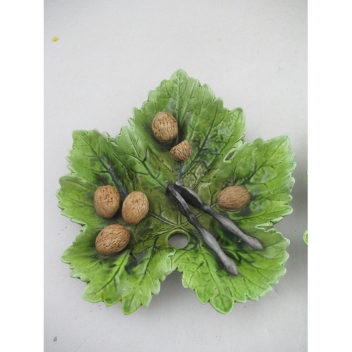 377 - Two Bretby pottery leaf dishes, with moulded decorated of walnuts and nut crackers