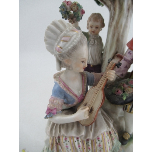 386 - A Meissen porcelain figure group, with a seated lady playing a lute, a man offering flowers in his h... 