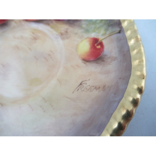 403 - A Royal Worcester coffee cup and saucer decorated with fruit by Freeman