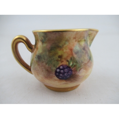 405 - A Royal Worcester miniature milk jug decorated with Fruit by Freeman height approx 1.25ins