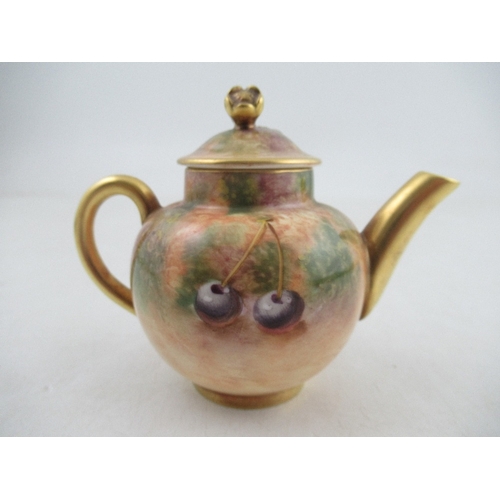 407 - A Royal Worcester miniature tea pot by Roberts height 3.25ins