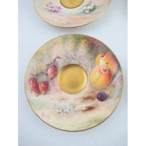 409 - A Royal Worcester cased set of 6 miniature tea cups and saucers decorated with hand painted fruit  b... 